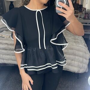 Gracia used black and white top in good condition size small